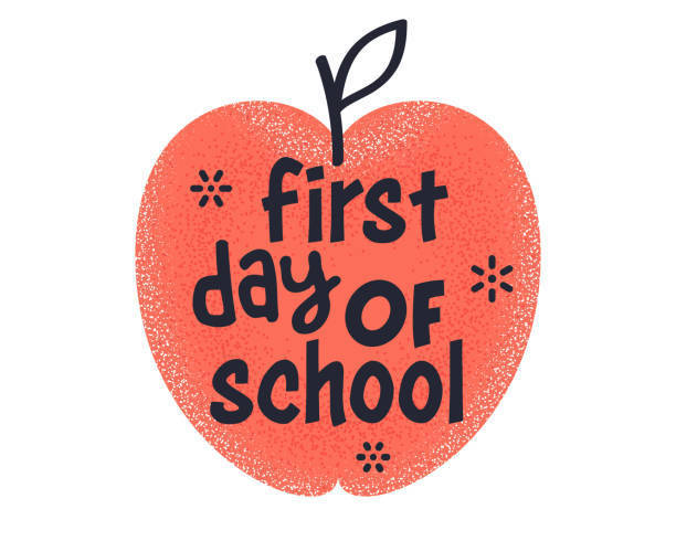 First day of school text on red apple in black font